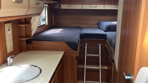 2p Carado semi-integrated from 2013 with single beds. 