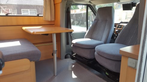 Comfortable camper with single beds and air conditioning
