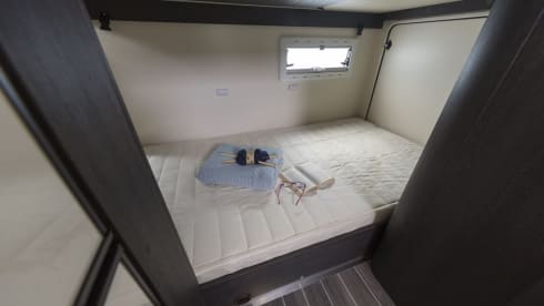 Roller Team Kronos M277 – 4 person camper with large alcove, 2 bed and bunk bed