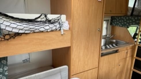 Fresh and complete family camper with bunk beds
