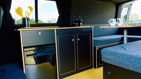 Mellow Yellow – Luxury VW T5 Camper with Large Bed & Luxury Black and Yellow Interior