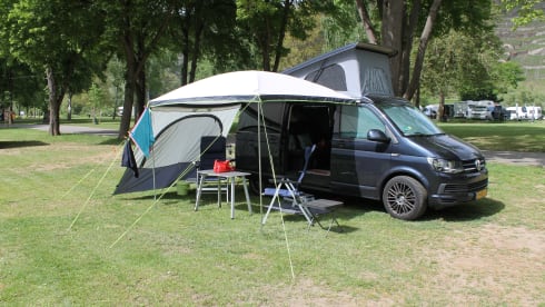 nice VW T6 Multivan with wide bed, pop-up roof, automatic