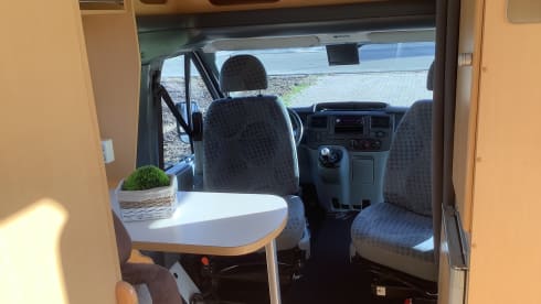 Semi-integrated camper