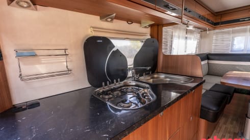 LMC Integral Camper with round seating layout