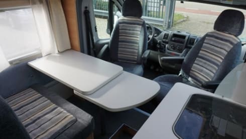Nice compact 2 person camper with single beds.