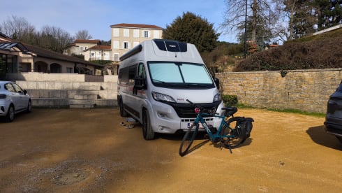 Off-grid campervan with lift-up bed, large garage 2024