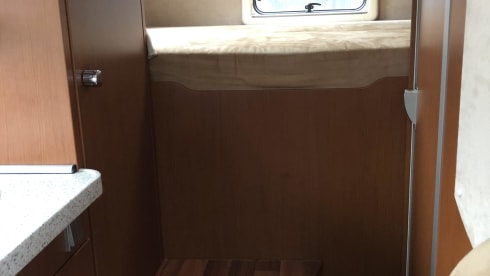 Wonderful luxury 4-person integral camper with plenty of storage space & bicycle carrier.