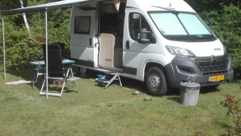 Nice Pössl camper van with comfortable bed