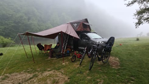 The AdventuresVan β Off-grid custom-made campervan with roof tent