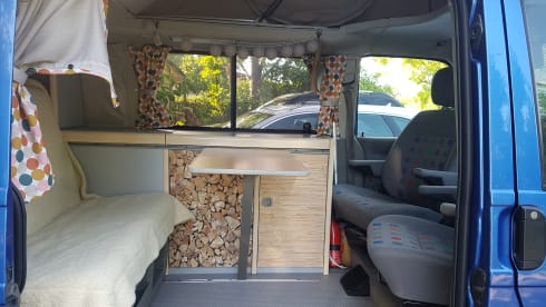 Cheerful Volkswagen camper van with lifting deck and pull-out bed for 2 people