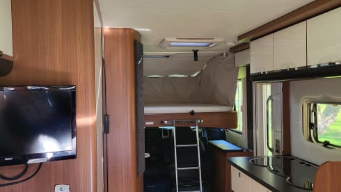 LMC integrated camper with round seating from 2018