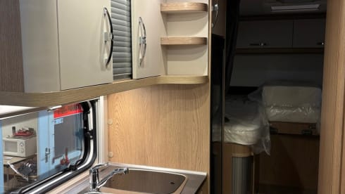 Compacte Hobby Optima V65 GE    2 persoons camper  BJ 2026