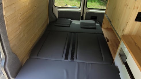 4-person Volkswagen with pop-up roof and long wheelbase for extra space