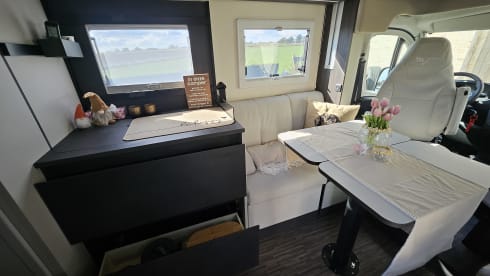 Luxury 4-person motorhome with bicycle rack and tow bar, model 2026