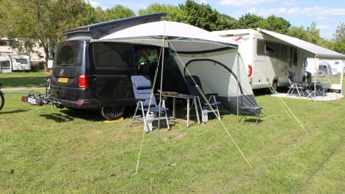 nice VW T6 Multivan with wide bed, pop-up roof, automatic