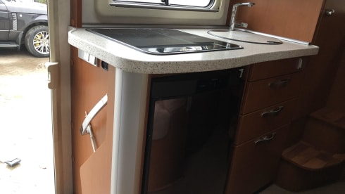 Wonderful luxury 4-person integral camper with plenty of storage space & bicycle carrier.