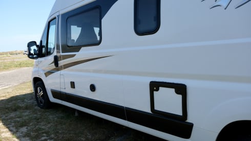 Atmospheric 4p Knaus Boxstar Family bus camper