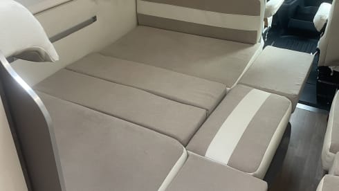 Spacious 7-person Rimor alcove family camper from 2019