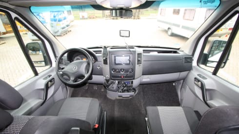 Completely restyled Mercedes Sprinter with XXL luxury fixed bed (double)