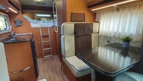 Very neat 6m camper for 3 people. Compact yet spacious!