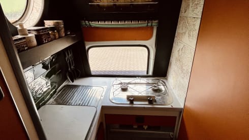 Tina – Retro Hippie Ford Transit Camper Petrol