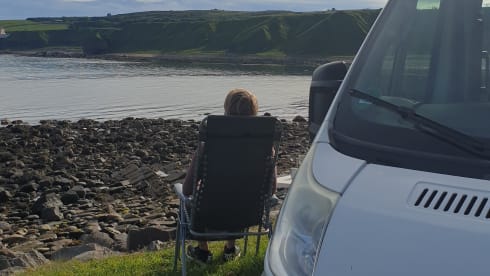 Compact off-grid Peugeot Boxer with length bed for 2 people