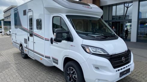 Enjoy comfort and freedom with this new semi-integrated camper