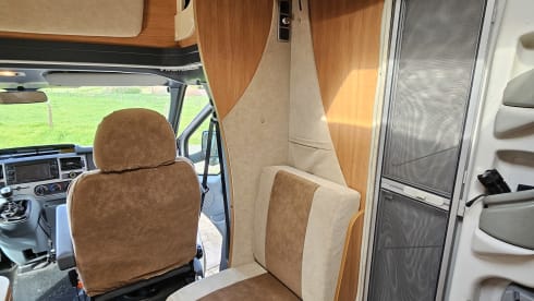 Comfortable motorhome with queen bed and electric bicycle carrier 
