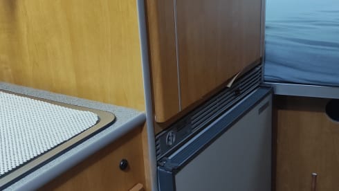 Cosy and compact 2p Ford Pösll campervan.