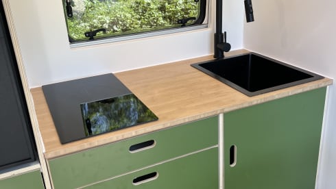 Trendy 2-person camper with solar panels