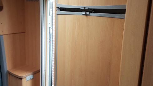 Comfortable camper with single beds and air conditioning