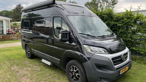 Super cool Hymer Ayers Rock bus camper for 2 people