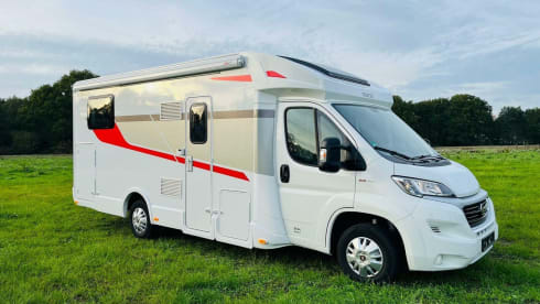 Koosje – Luxury Camper (5 persons) Lengthwise and lifting bed L-seat