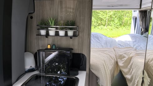 Yvonneke – Fiat: Off Grid-Nespresso-BIP&GO-Bicycle rack-Large refrigerator-LPG tank
