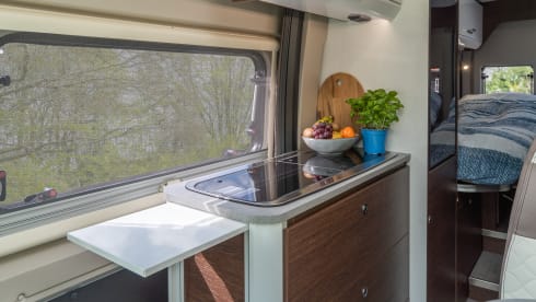 Off the Grid 1 – Brand new 6.36 bus camper with automatic transmission and solar panel, "off the grid no. 1"