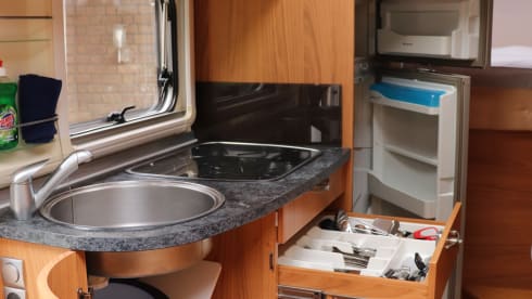 Camper with top layout