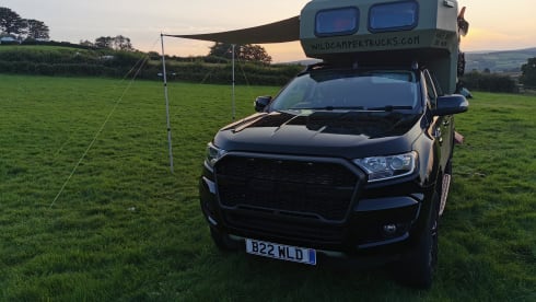 Edinburgh Airport - tardis camper on a pick up truck