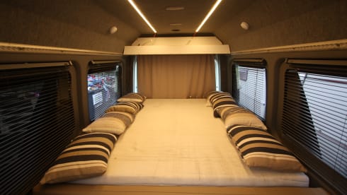 Completely restyled Mercedes Sprinter with XXL luxury fixed bed (double)