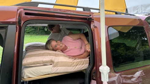 Super nice Volkswagen Caddy Maxi campervan from 2011 with tent, 4p
