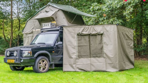 Charles  – Land Rover Disco II met rooftop tent