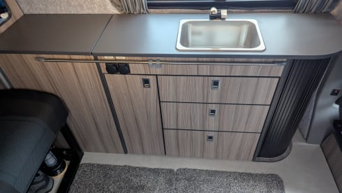 Exclusive camper van VW T5 with pop-up roof