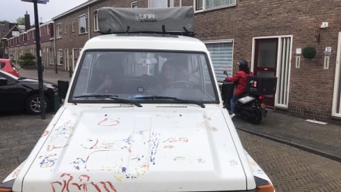Unique camping cruiser 4x4 with roof tent