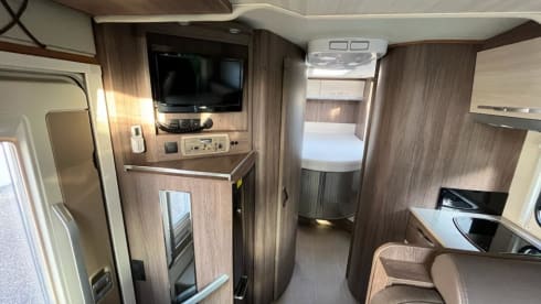 Bürstner/Fiat Ducato semi-integrated from 2016 with full leather upholstery.