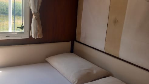 ELNA – Nice, spacious family camper with a separate bedroom and fuel compensation.