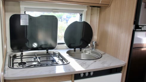 3 – Spacious 2-person camper with single beds or king-size bed!