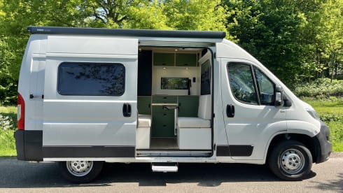 Trendy 2-person camper with solar panels
