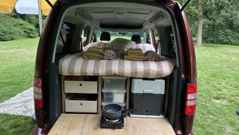 Super nice Volkswagen Caddy Maxi campervan from 2011 with tent, 4p