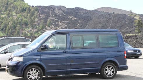 powerful VW T5 Multivan camper van with spacious Reimo pop-up roof