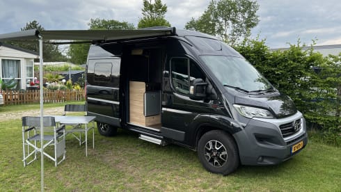 Super cool Hymer Ayers Rock bus camper for 2 people