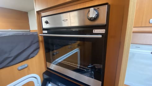 Speedy – Motorsport en Adventure - 7x7 garage en trekhaak voor 2500kg